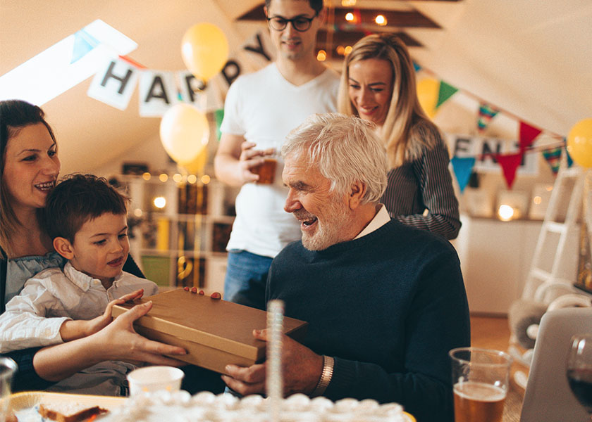 Man celebrating retirement with family